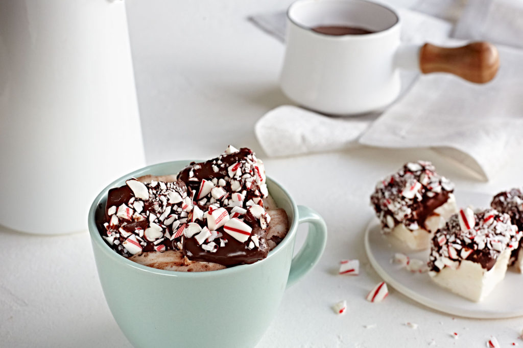 Homemade peppermint chocolate marshmallows with hot chocolate.