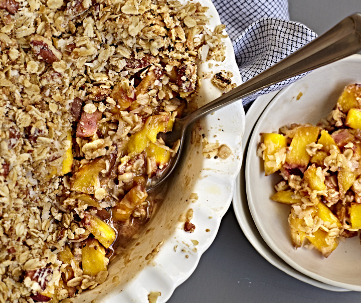 Gluten-free peach crisp with oat topping/