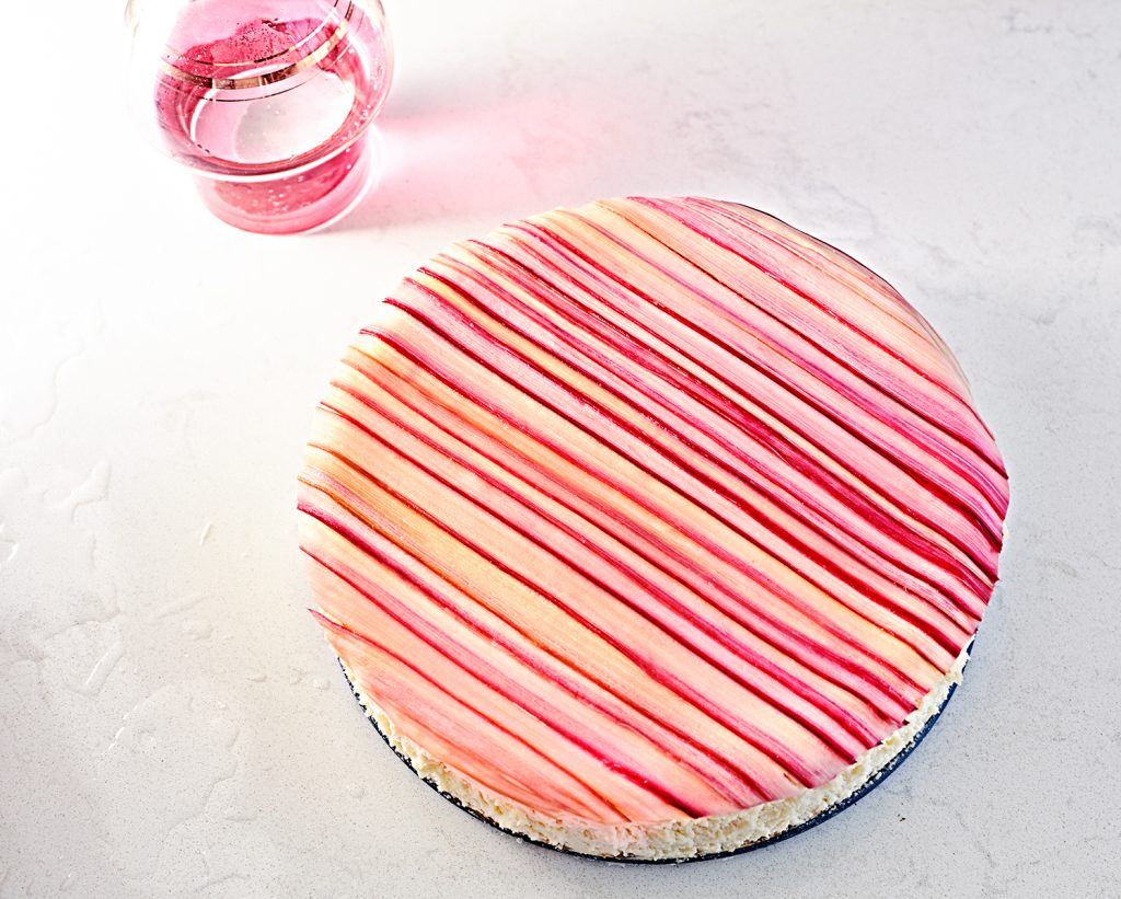 Candied rhubarb gluten-free cheesecake with a rhubarb ginger cocktail.