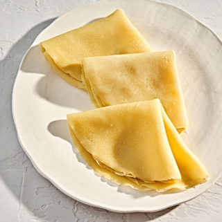 Handmade plate with gluten-free french-style crepes.