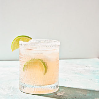Refreshing glass of grapefruit lime paloma mexican cocktail.